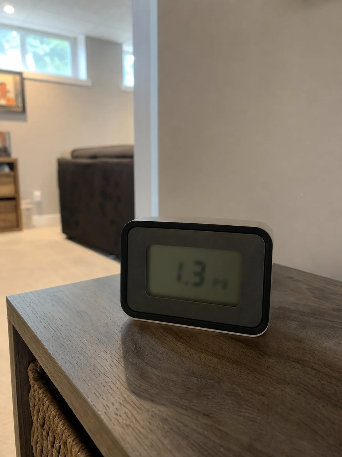 Continuous radon monitor running a test in a Lincoln basement